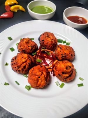  Tandoori Momos: ¡Una explosión picante de especias y texturas suaves que te transportará directamente a las calles de Thiruvananthapuram!